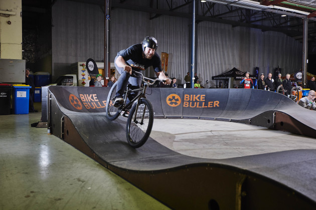Connor Hunter sends it into the back straight.
